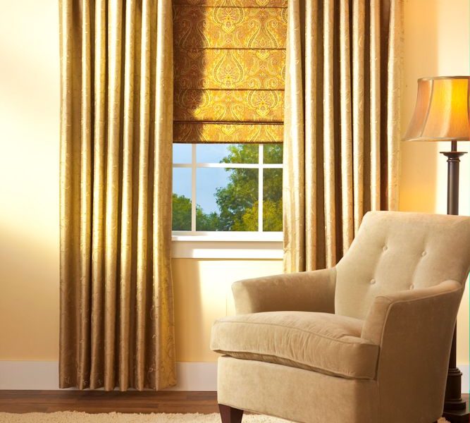 Custom drapery and side panels framing a living room window