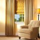 Custom drapery and side panels framing a living room window